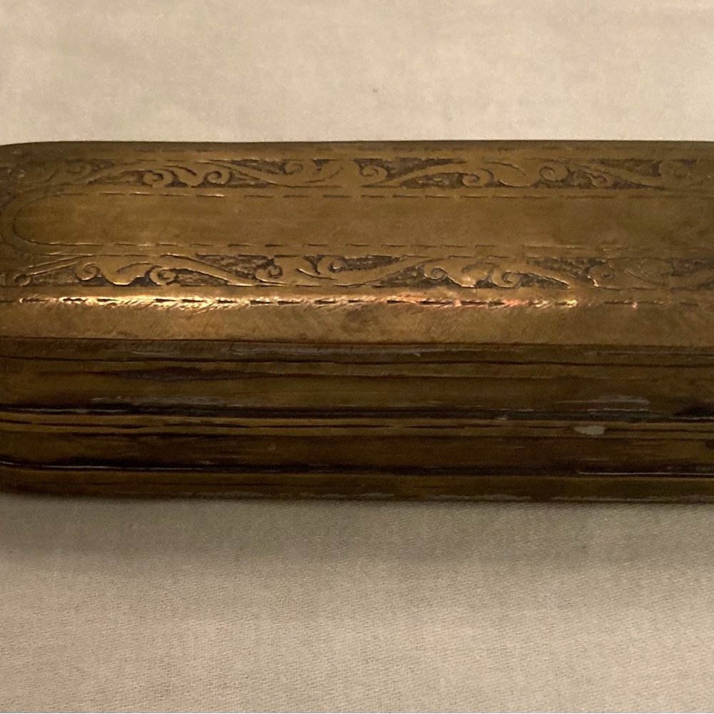 Antique deco oval brass box with hinged lid, etched deco pattern good condition